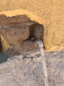 Downtown Adobe Wall with contemporary plumbing