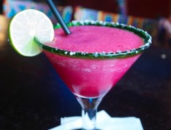 Prickly Pear Margarita using Tequila from the agave plant and the juice of cactus buds